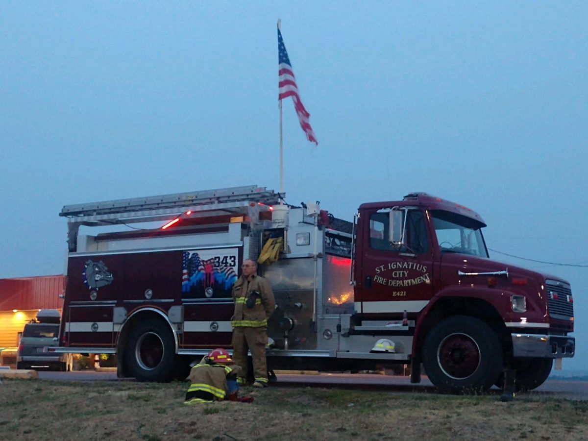 Fireman with firetruck