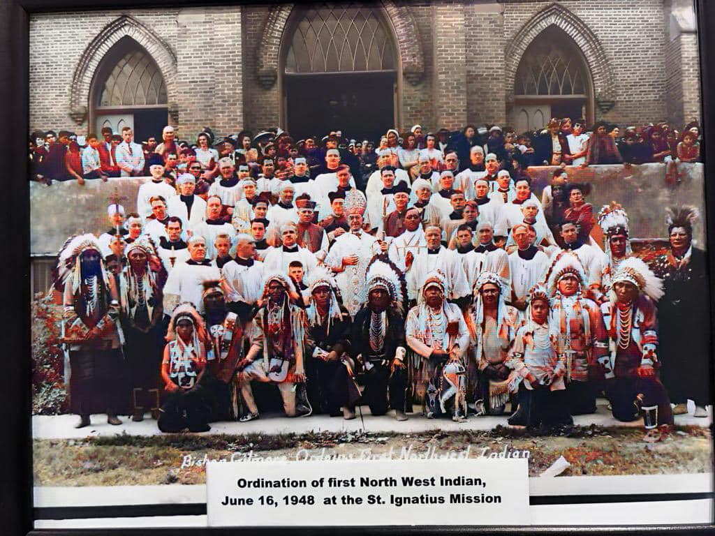 Group Photo Catholic Priest and Indigenous People